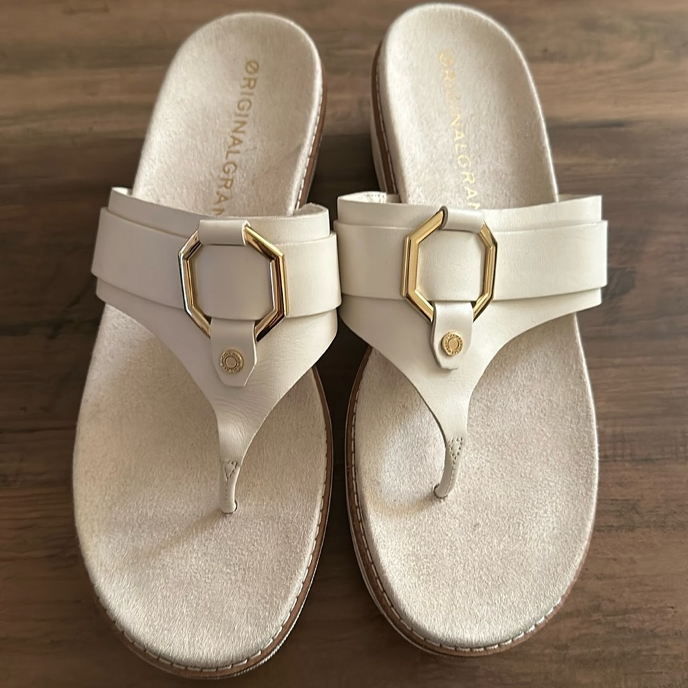 Beautiful Cole Haan slip on sandals in crème color